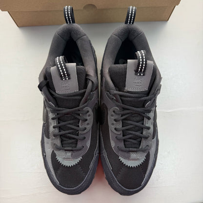 Nike black Air Max 90 Futura trainers with grey accents and logo detail.