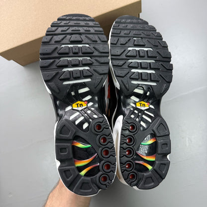 Nike black trainers rainbow gradient design with Viotech accents and Air Max cushioning.
