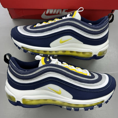 Nike Air Max 97 dark blue trainers with opti yellow and white accents, logo detail.