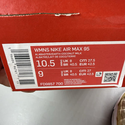 Nike Air Max 95 trainers yellow with textured upper and signature swoosh logo.