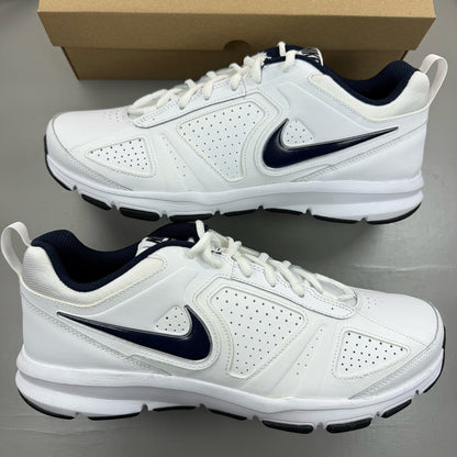 Nike white running trainers with black and navy accents, featuring logo details.
