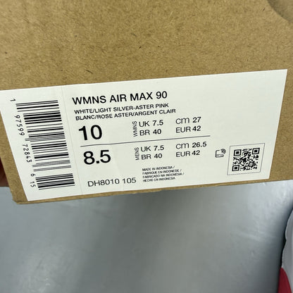 Nike Air Max 90 trainers white with pink and black accents, featuring logo details.