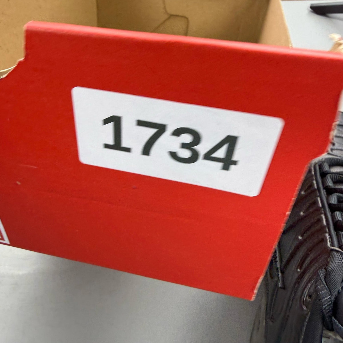 Nike Air Max Plus TN Premium black trainers with signature logo and sleek design.
