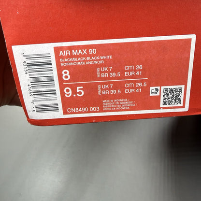 Nike Air Max 90 Recraft black trainers with textured upper and signature swoosh logo.