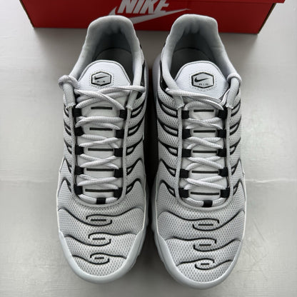 Nike Air Max Plus TN grey trainers mismatched sizes with distinctive logo and sleek design.