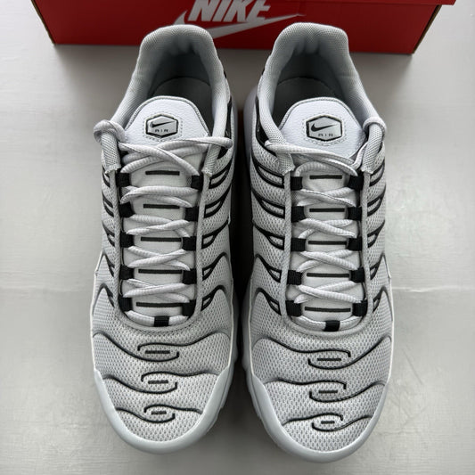Nike Air Max Plus TN grey trainers mismatched sizes with distinctive logo and sleek design.
