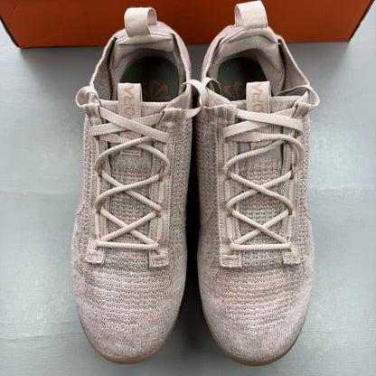 Nike Air VaporMax 2021 Flyknit pink trainers with breathable knit upper and signature logo.