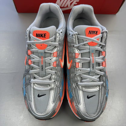Nike P-6000 grey trainers with metallic accents and crimson blue fury details.