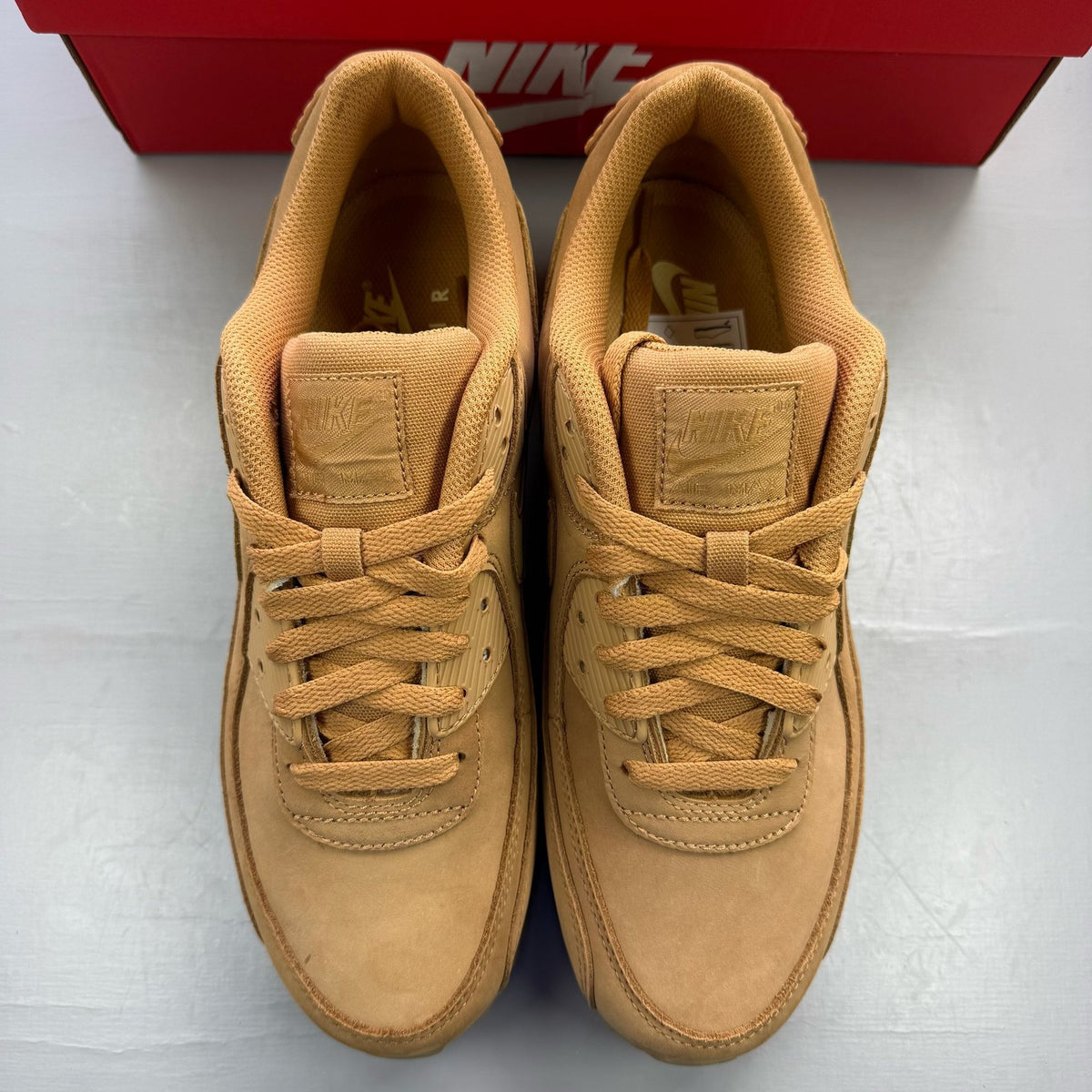 Nike brown trainers with gum sole and premium winter wheat colorway.