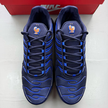 Nike soccer ball blue with French Football Federation logo and textured surface.