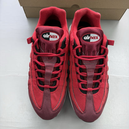 Nike Air Max 95 red maroon black white trainers with signature logo and mesh detailing.