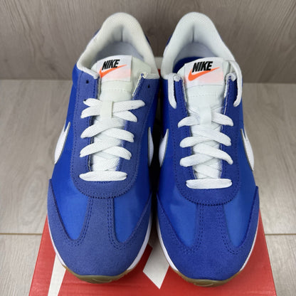Nike trainers game royal blue with white and black accents, featuring logo detail.