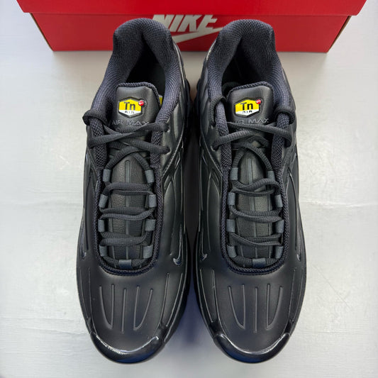 Nike Air Max Plus TN 3 black leather trainers with distinctive wave pattern and logo.