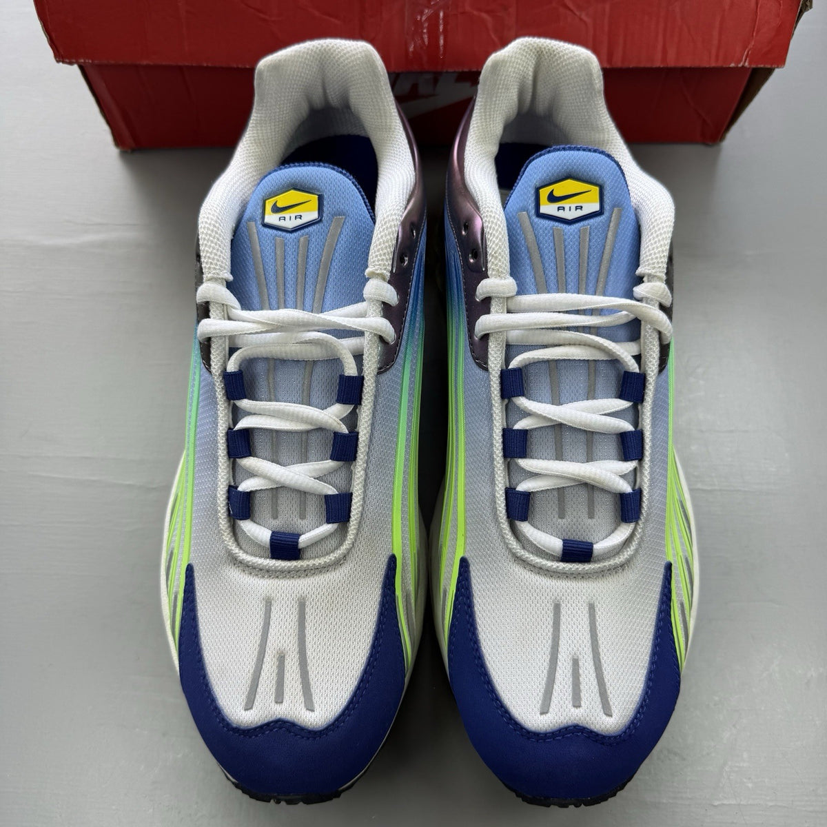 Nike Air Max Plus II white trainers with Valerian Blue and Ghost Green accents.