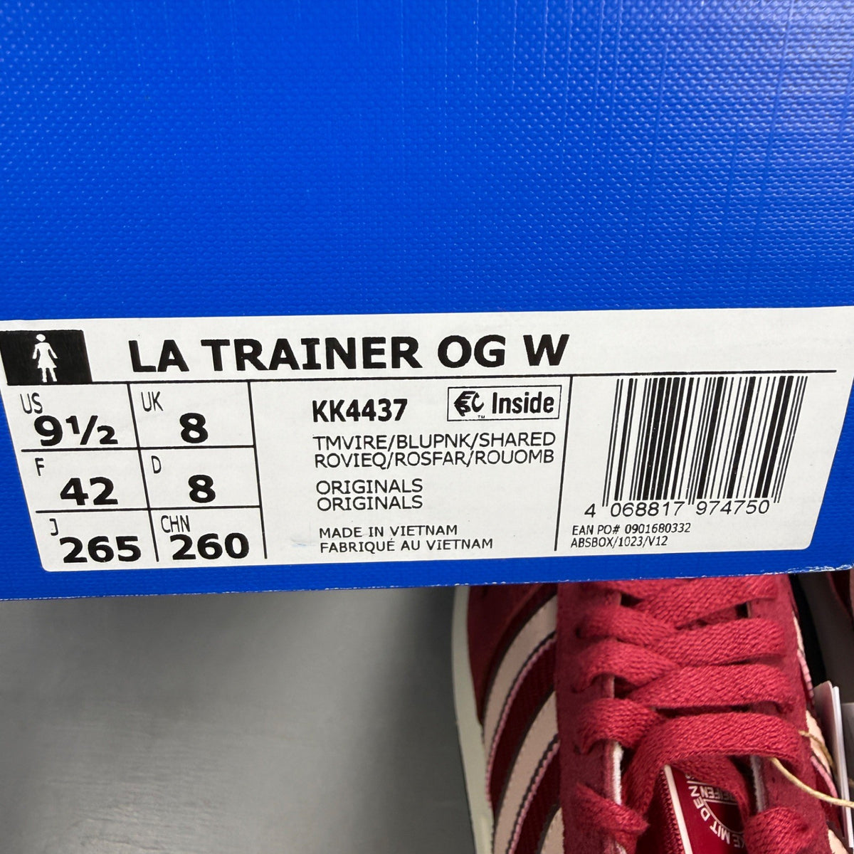 Adidas pink trainers with white stripes and logo, featuring a retro design.