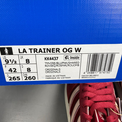 Adidas pink trainers with white stripes and logo, featuring a retro design.