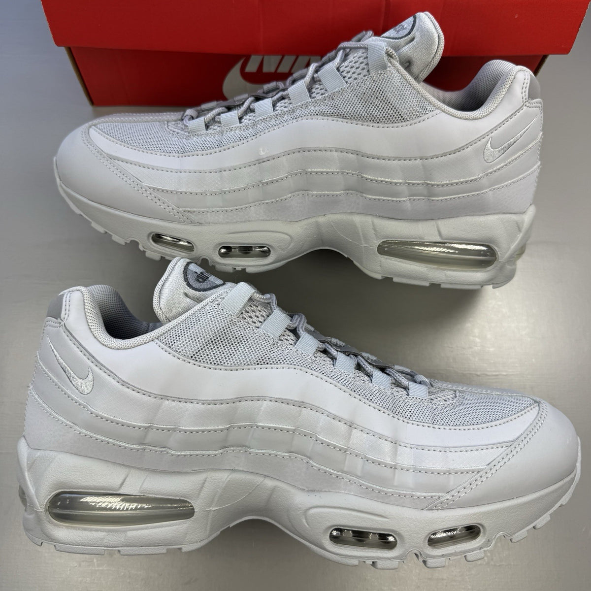 Nike Air Max 95 trainers grey with big bubble design and signature logo.