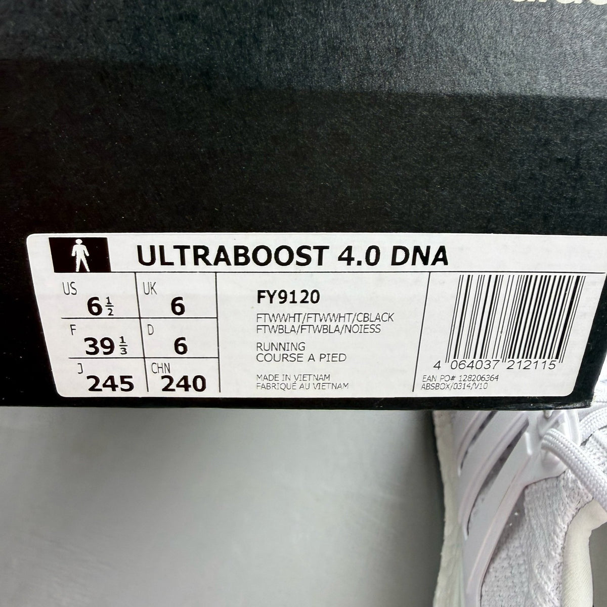 Adidas Ultra Boost 4.0 DNA white trainers with black accents and signature three-stripe logo.