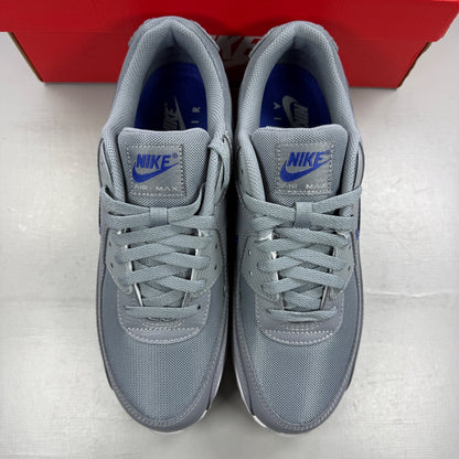Nike athletic shoes grey with blue accents and Air Max logo detail.