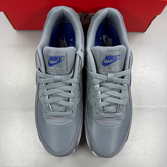 Nike athletic shoes grey with blue accents and Air Max logo detail.