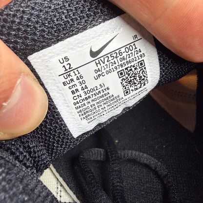 Nike running shoes blue with safety orange accents and signature logo.