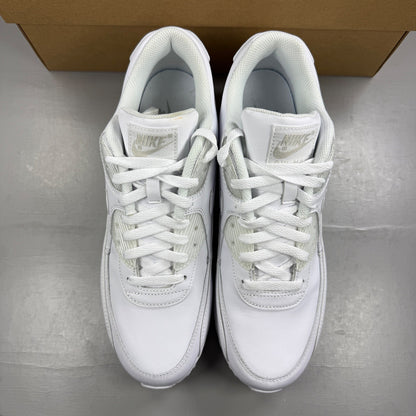 Nike white trainers leather upper with Air Max cushioning and classic logo details.