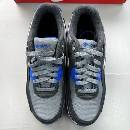 Nike Air Max 90 grey sneakers with Gore-Tex material and blue accents.