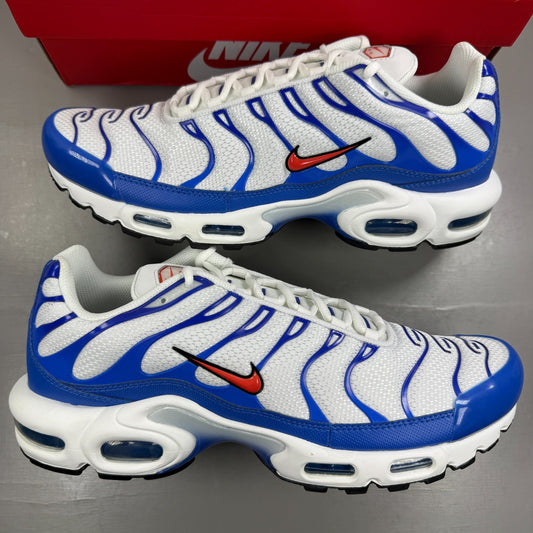 Nike running shoes white with Signal Blue accents and Air Max cushioning.