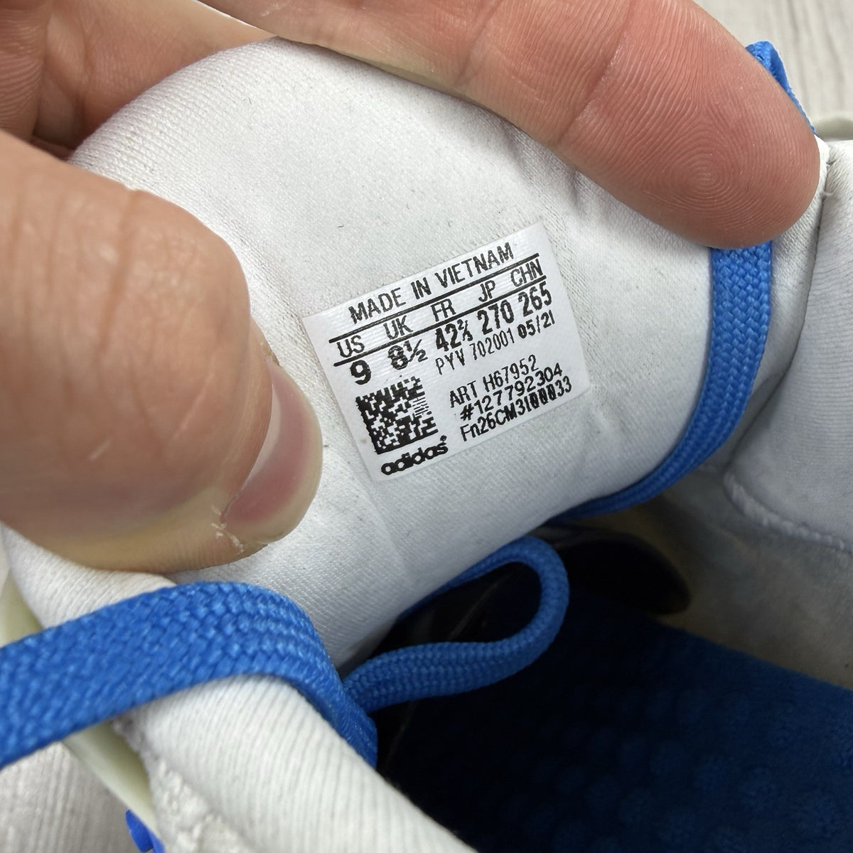 Adidas grey Ultra Boost trainers with blue accents and distinctive LEGO branding.