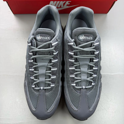Nike Air Max 95 grey trainers with distinctive design and logo details.