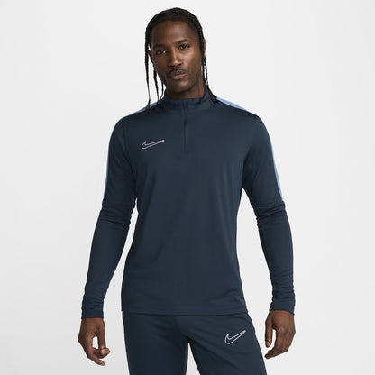 Nike blue Dri-FIT 1/4 zip top with logo and breathable material.