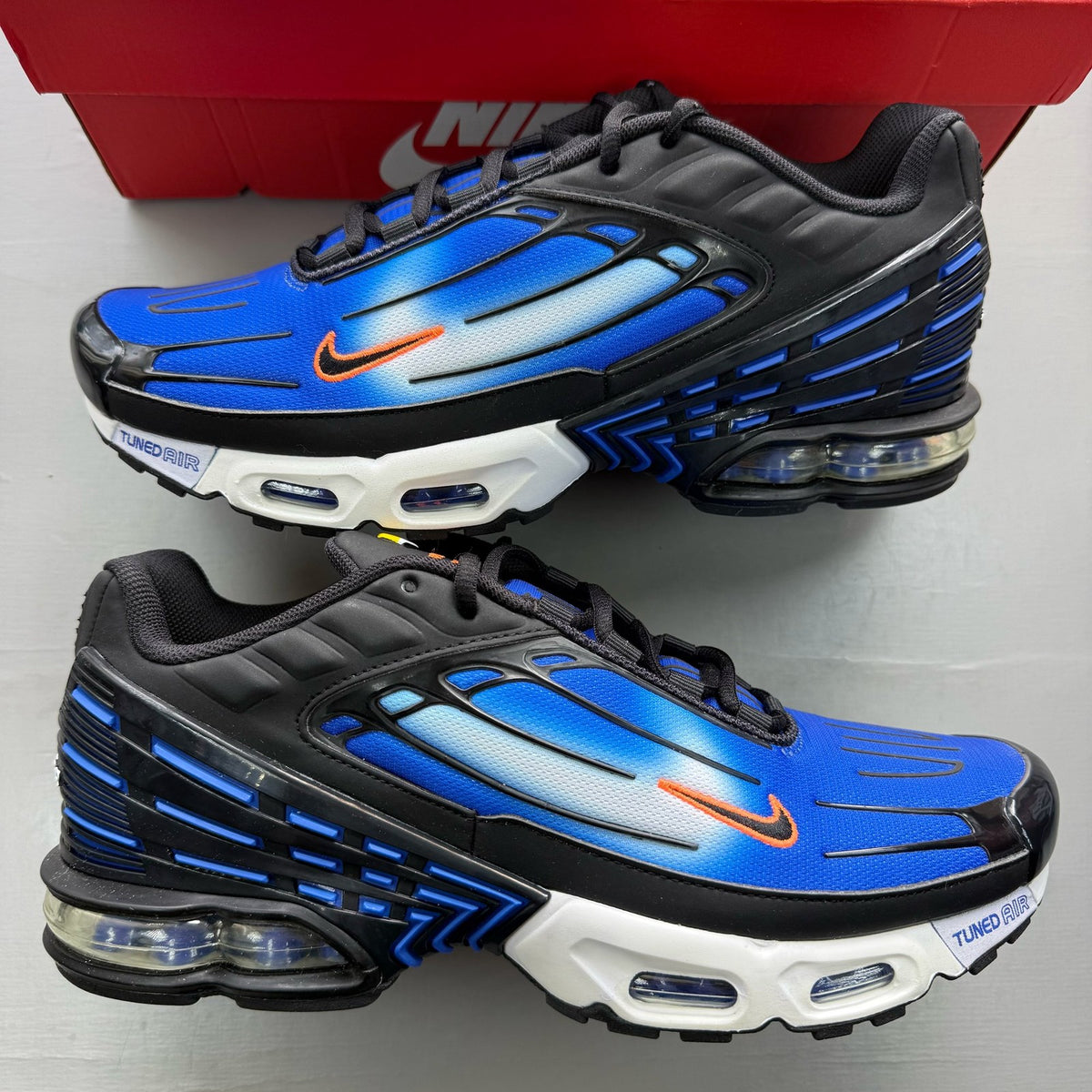 Nike Air Max Plus TN 3 blue trainers with black accents and iconic swoosh logo.