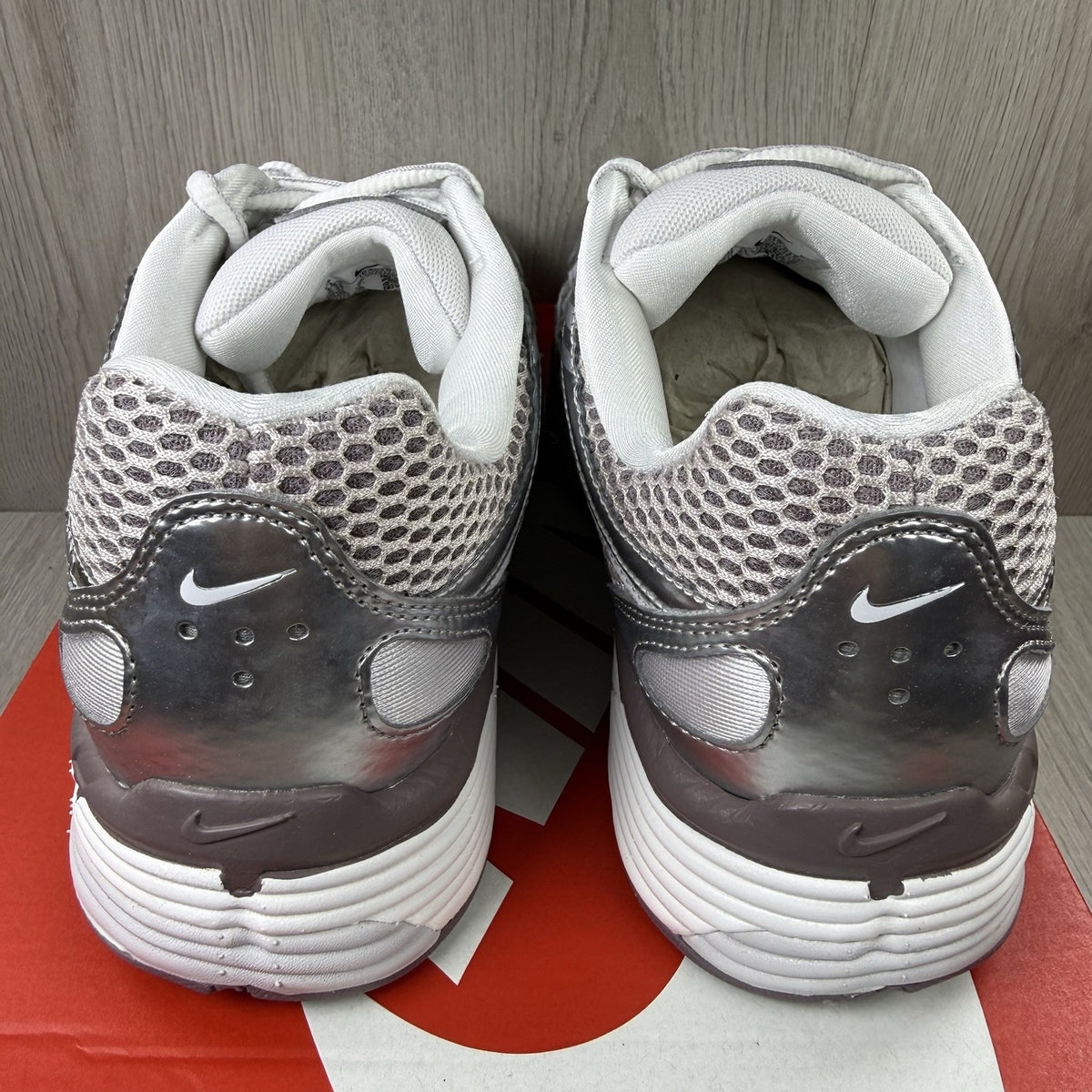 Nike P-6000 trainers grey with platinum violet accents and mesh upper details.
