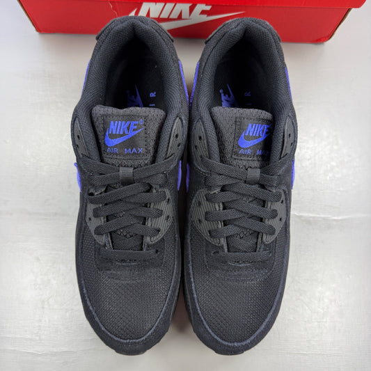 Nike deck shoes black with sapphire accents and signature swoosh logo.