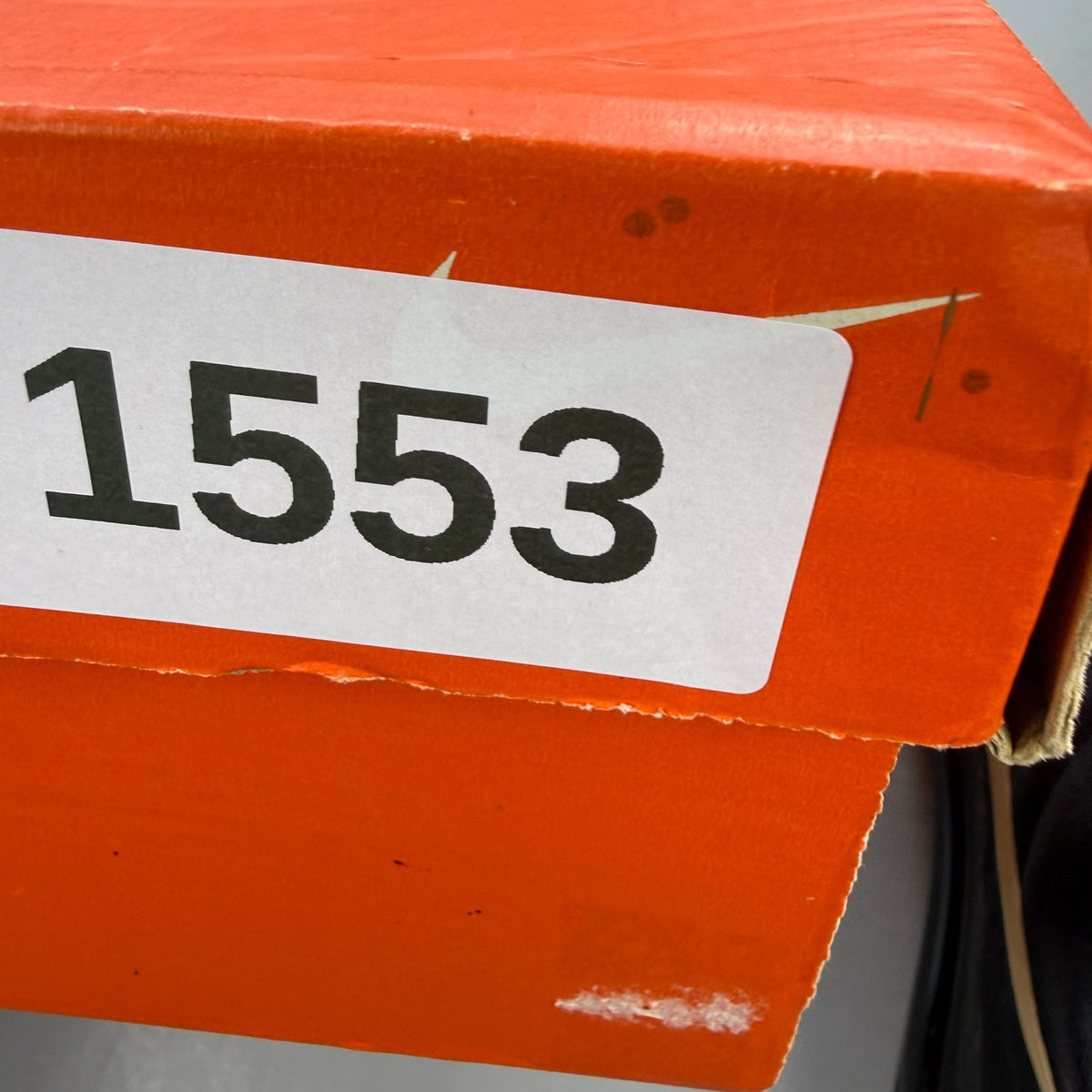 Nike Air Max 2017 GS trainers black with metallic gold accents and logo detail.