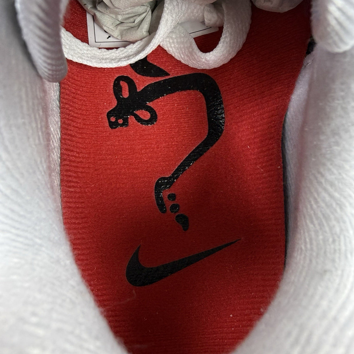 Nike Air Max 1 trainers grey with white accents and signature swoosh logo.