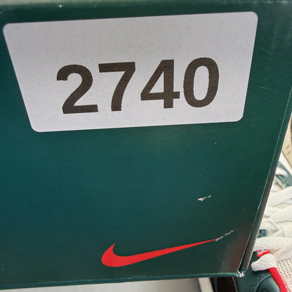 Nike Air Max 1 white trainers with LeBron James logo and Liverpool FC details.