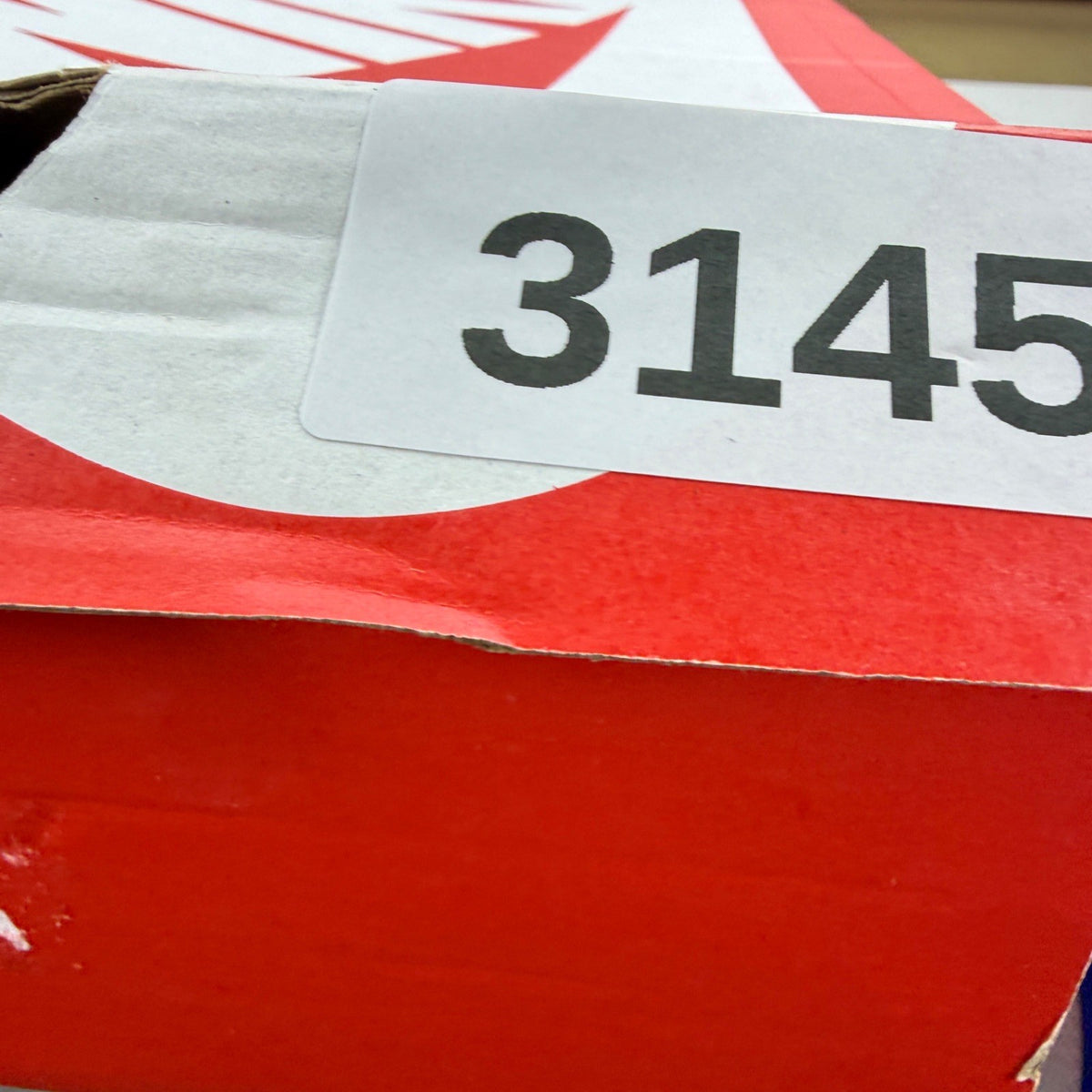 Nike trainers white with signal blue accents and distinctive Air Max Plus design.
