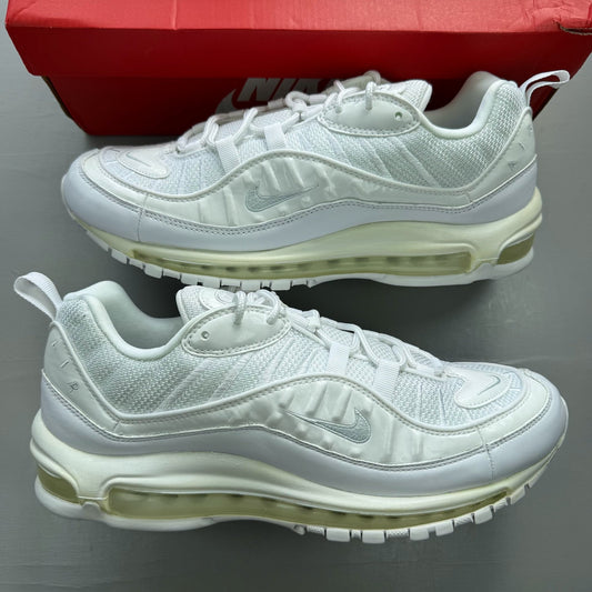 Nike Air Max 98 white trainers with platinum accents and signature swoosh logo.
