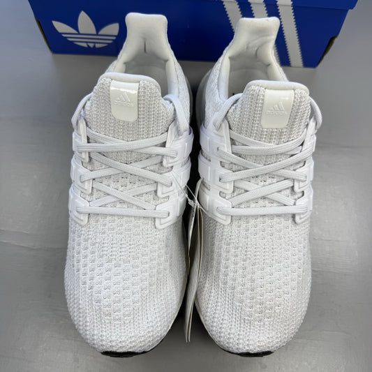 Adidas Ultra Boost 4.0 DNA white running trainers with mesh upper and signature three stripes.