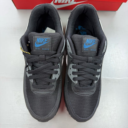 Nike Air Max 90 black trainers with grey accents and logo detail.