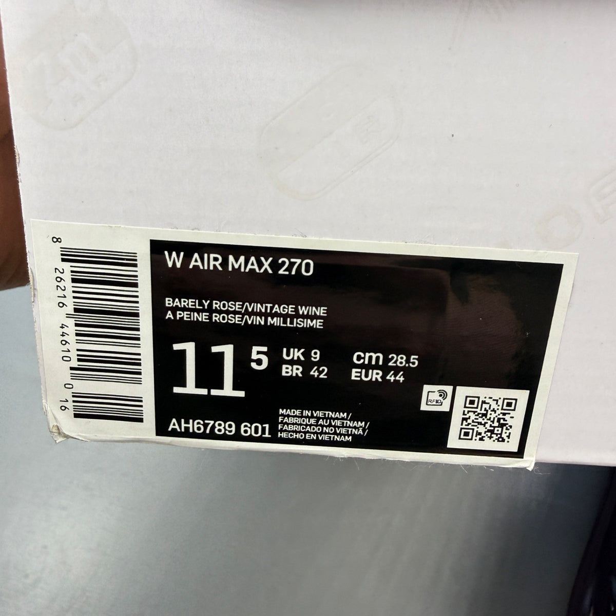Nike trainers barely rose pink with white accents and Air Max cushioning.