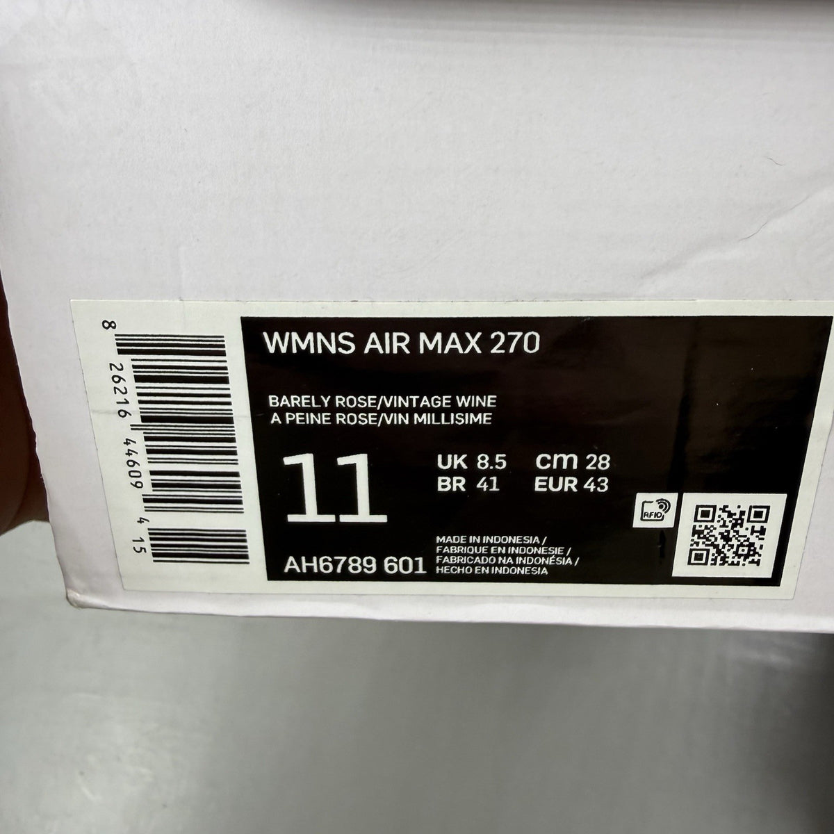 Nike Air Max 270 pink trainers with vintage wine accents and white sole.