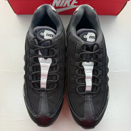 Nike Air Max 95 black sneakers with metallic silver accents and big bubble sole design.