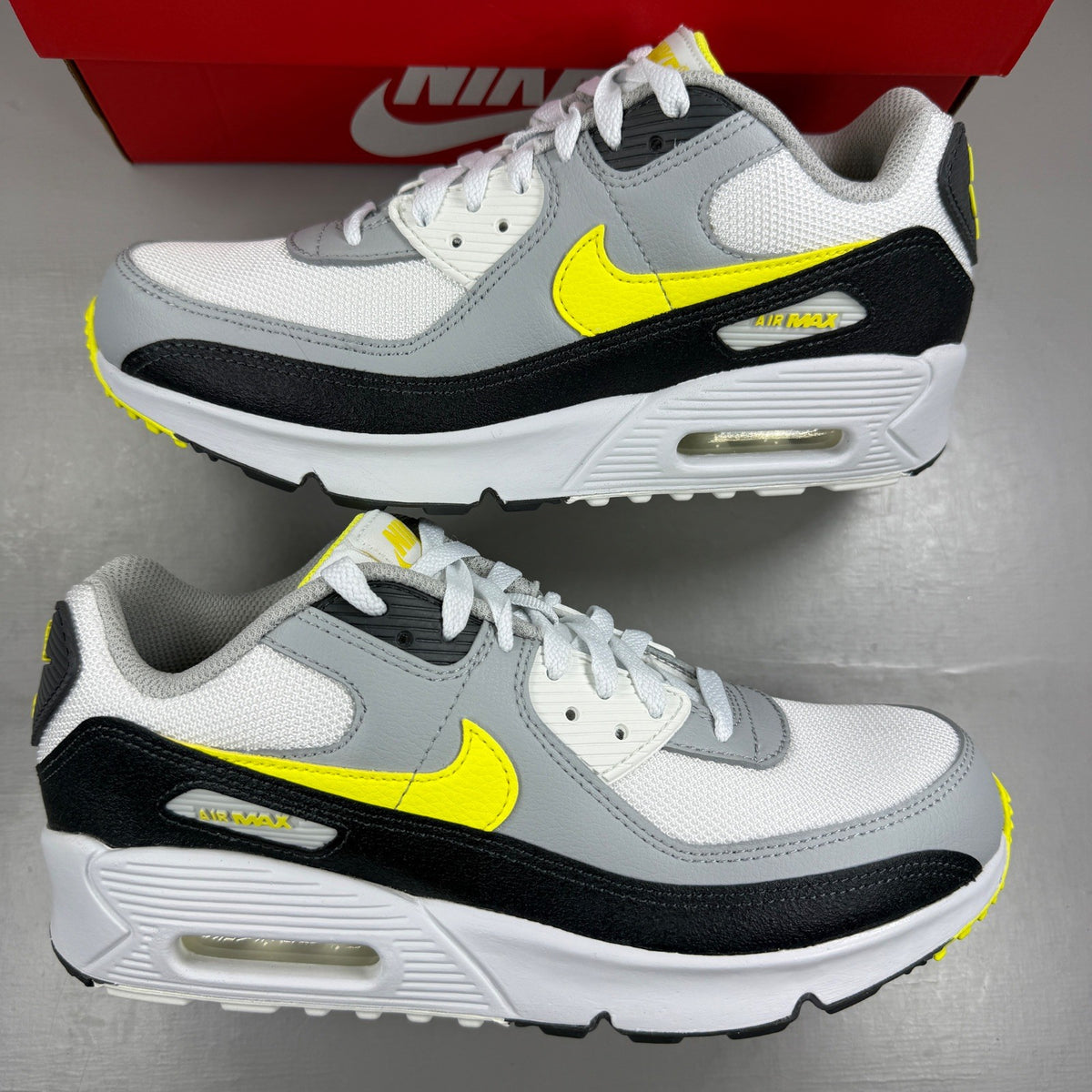 Nike deck shoes grey with sonic yellow accents and white sole.
