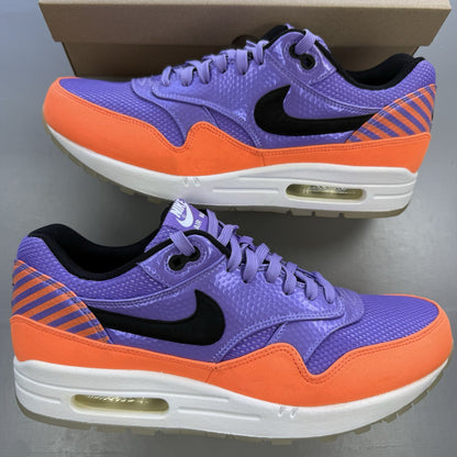 Nike Air Max 1 white trainers with atomic violet and orange accents, 100% authentic.