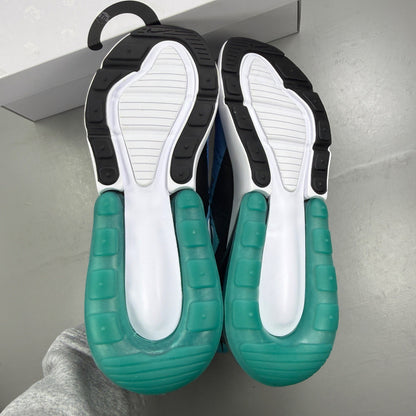 Nike Air Max 270 blue trainers with white accents and logo detailing.