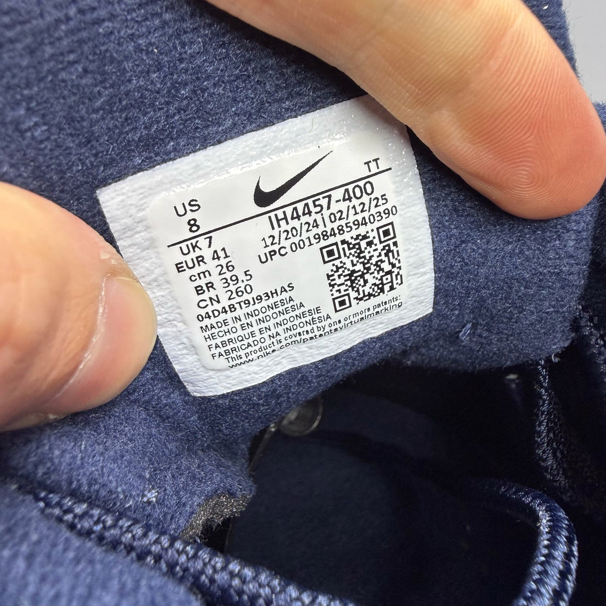 Nike Air Max 95 blue trainers with big bubble sole and logo detailing.