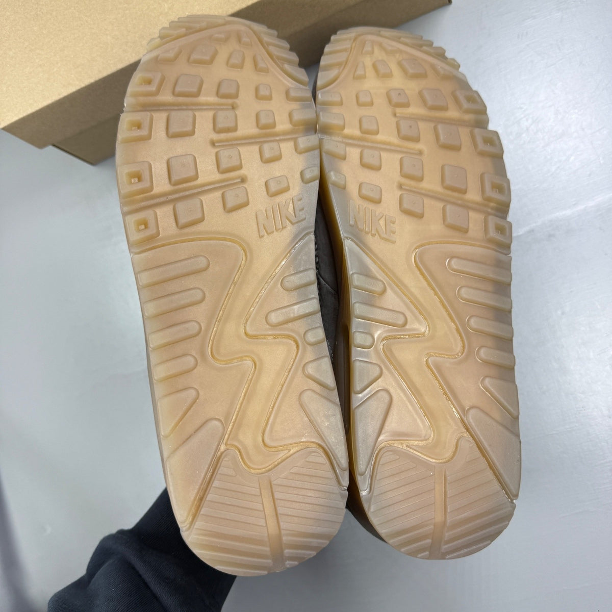 Nike deck shoes brown with gum sole and logo detailing.