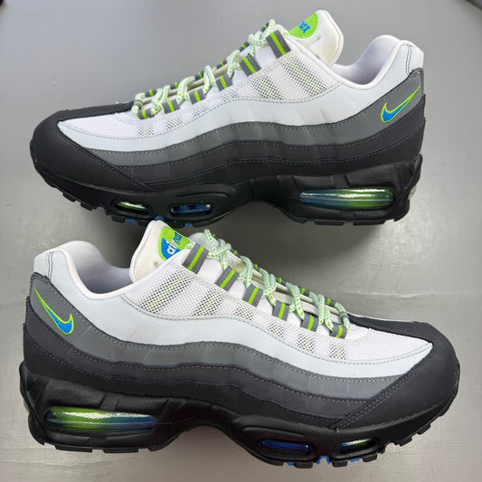 Nike Air Max 95 green trainers with big bubble design and blue accents.